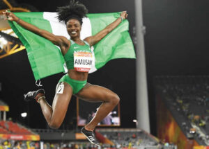 Nigeria's Tobi Amusan celebrating her record breaking feat (Photo Credit: Athletic World)